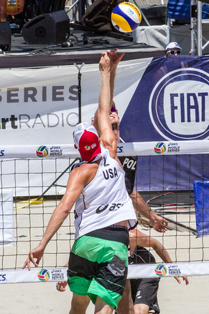 Mariusz Prudel and Theo Brunner battle high above the net